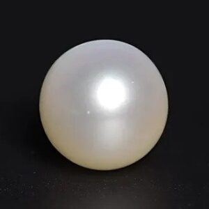 Original white moti gemstone from the best moti shop near me on black background