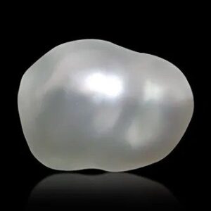 Original white moti gemstone from the best moti shop near me on black background