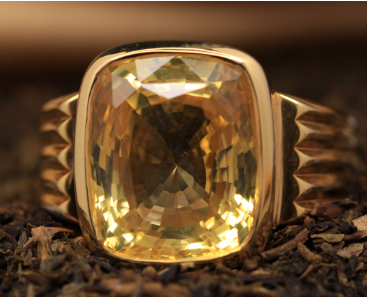 Pukhraj stone ring in gold setting for astrology and prosperity