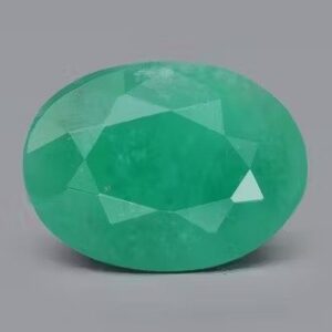 Shiny green emerald gemstone from original gemstone shop in Pune